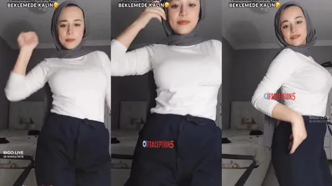 Tango Hatice türbanıyla odasında kıvrılarak poz veriyor