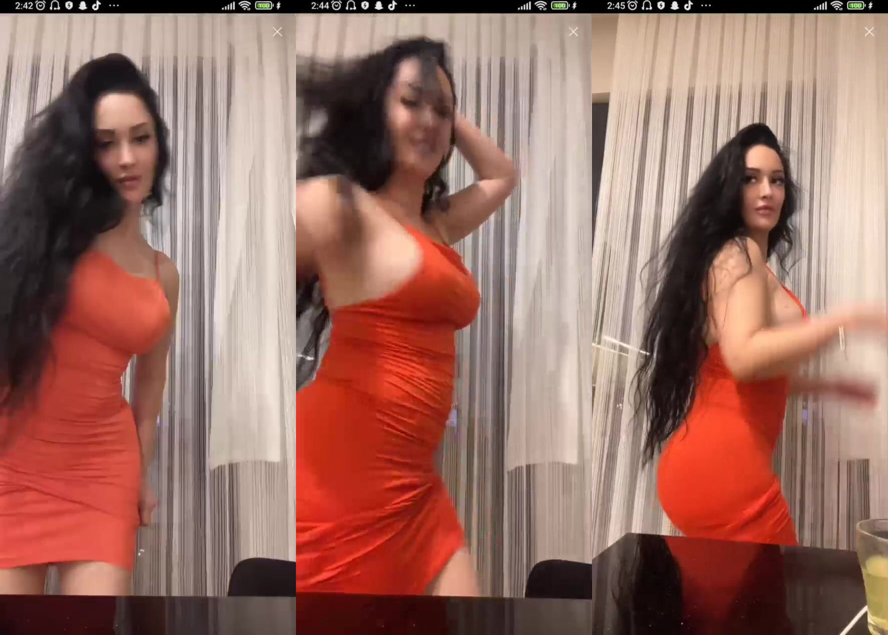 zemheri tango turuncu elbisesiyle kalçalarını sallayıp dans ediyor