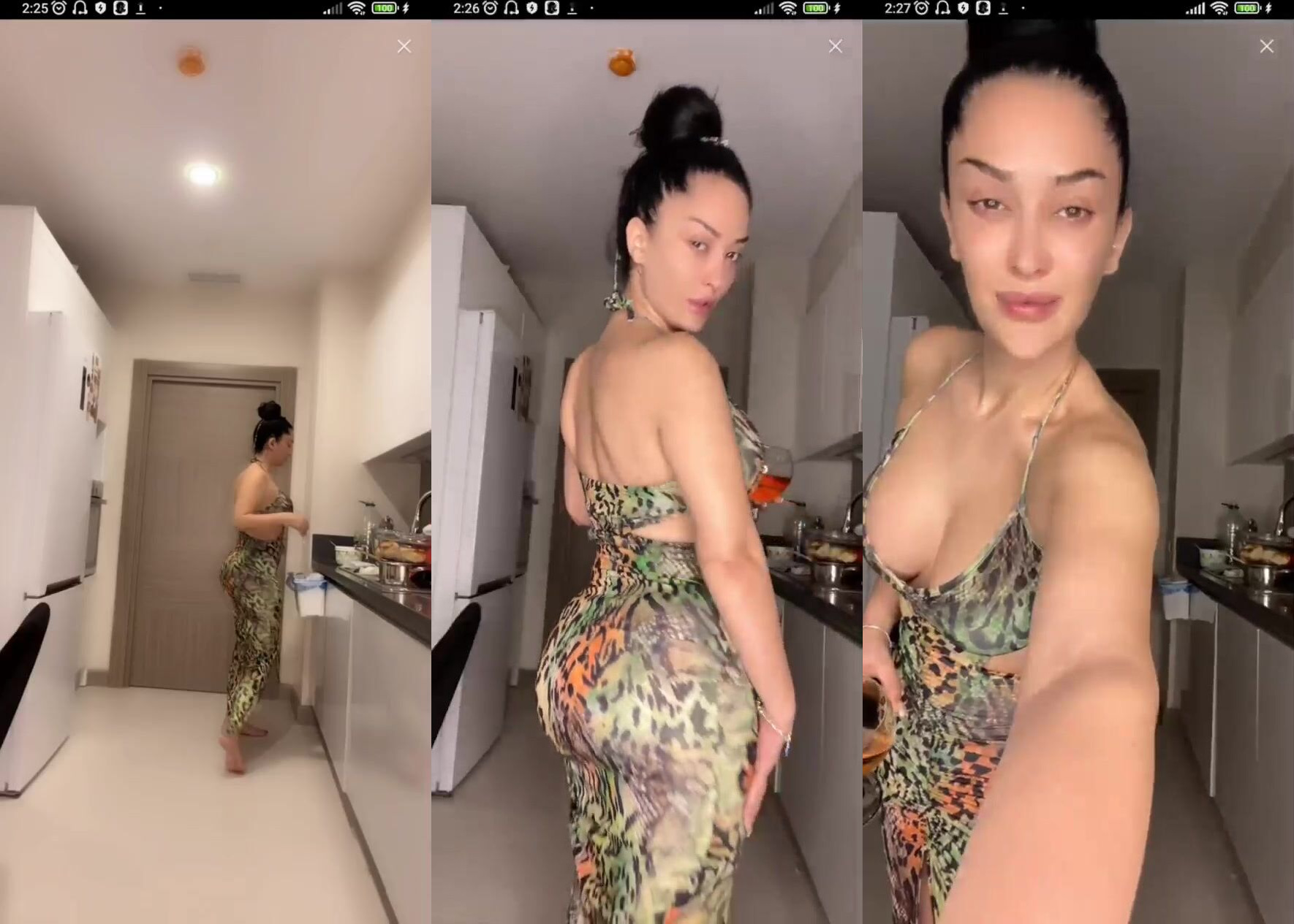 zemheri tango seksi elbisesiyle mutfakta kalçasını okşayıp içki içiyor