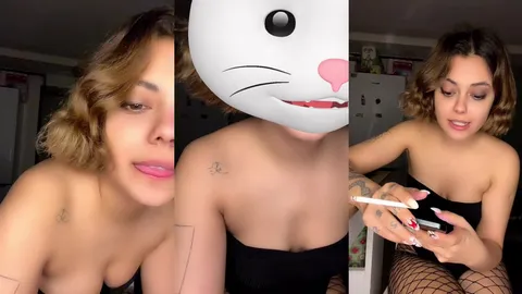 tango doa file çorapla sigara içip telefon kurcalıyor